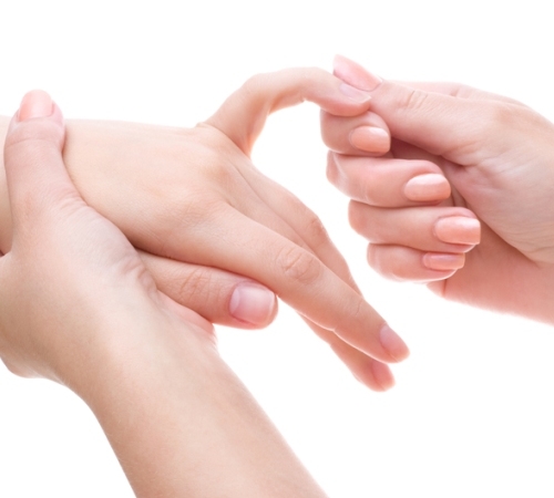 female palm and fingers massage, isolated on white